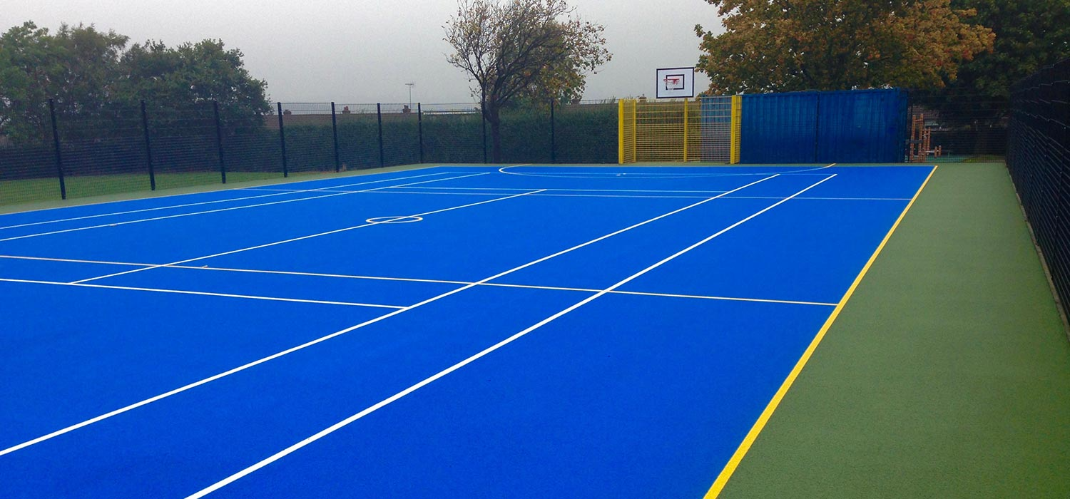 Resin bound surfacing for sports areas